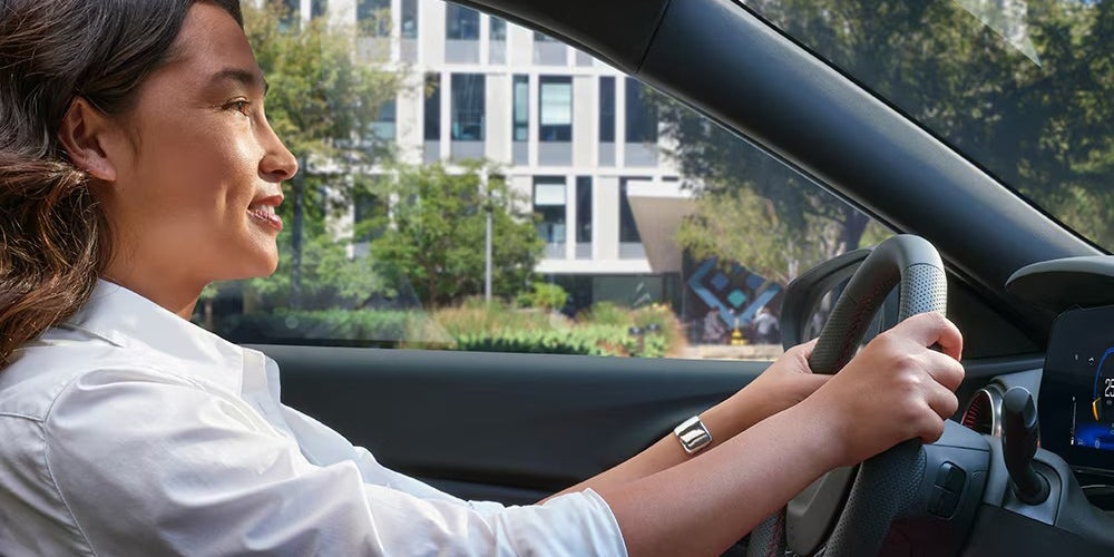 Woman driving a Chevrolet vehicle
